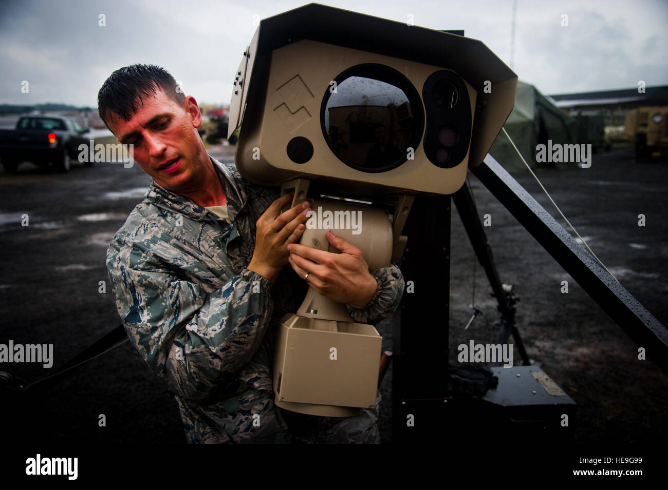 Security Wing Security forces member from the 621st Contingency Response Wing carries ...