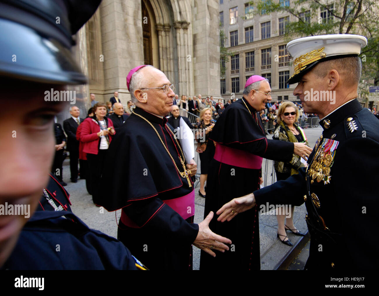 Gen. Peter Pace, chairman of the Joint Chiefs of Staff, meets with Roman Catholic leadership outside St. Patrick's Cathedral during the Columbus Day Parade along Fifth Avenue in New York, Monday, Oct. 9, 2006. Gen. Pace, who was born in Brooklyn, New York to Italian-American parents, was selected by the Columbus Citizens Foundation to be the Grand Marshal. Defense Dept.  U.S. Air Force Staff Sgt. D. Myles Cullen (released) Stock Photo