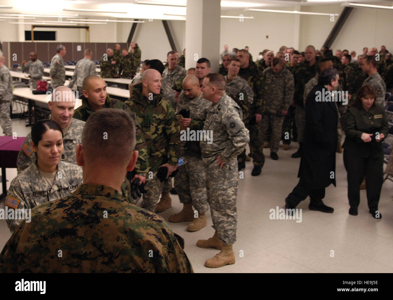 General Peter Pace, chairman of the Joint Chiefs of Staff, shakes the hands of individuals assigned to the 1/25 SBCT formerly the 172nd, at the conclusion of a Town Hall meeting at Fort Wainwright, AK., Feb. 22, 2007. Defense Dept  Staff Sgt. D. Myles Cullen (released) Stock Photo