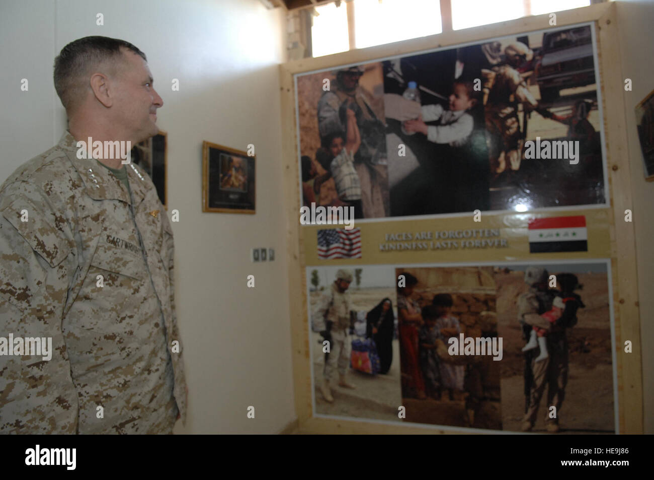 Marine Corps Gen. James E. Cartwright, vice chairman of the Joint Chiefs of Staff, looks over a wall of photos at Al Asad Air Base, Iraq, Nov. 22, 2007. Cartwright traveled to Iraq to spend Thanksgiving with troops.  Tech. Sgt. Adam M. Stump, U.S. Air Force. (Released) Stock Photo