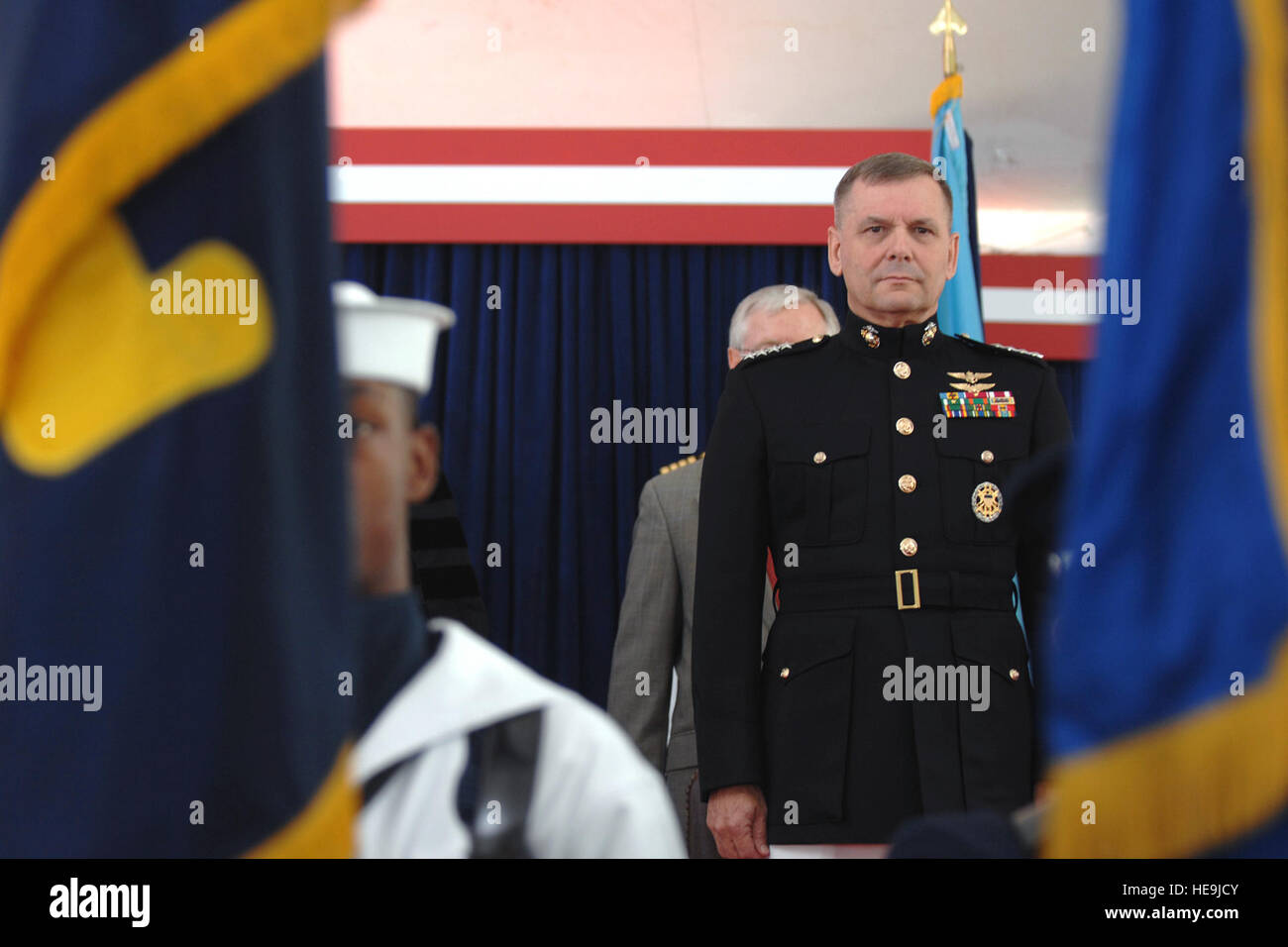 Marine Corps Gen. James E. Cartwright, vice chairman of the Joint Chiefs of Staff, stands at attention while the National Anthem plays at the National Defense University graduation at Fort Lesley J. McNair in Washington, D.C., June 12, 2008. Cartwright was the keynote speaker at the graduation.  Air Force Master Sgt. Adam M. Stump. (Released) Stock Photo