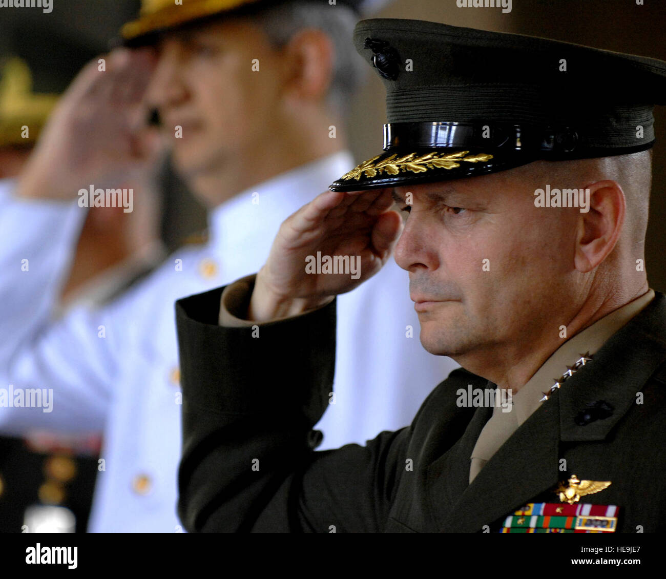 Vice Chairman of the Joint Chiefs of Staff Marine Gen. James E. Cartwright and Turkish officers salute at the Ataturk Mausoleum in Ankara, Turkey, July 3, 2008. Cartwright visited Turkey to meet with his counterparts on U.S.-Turkish security matters.  Air Force Master Sgt. Adam M. Stump. (Released) Stock Photo