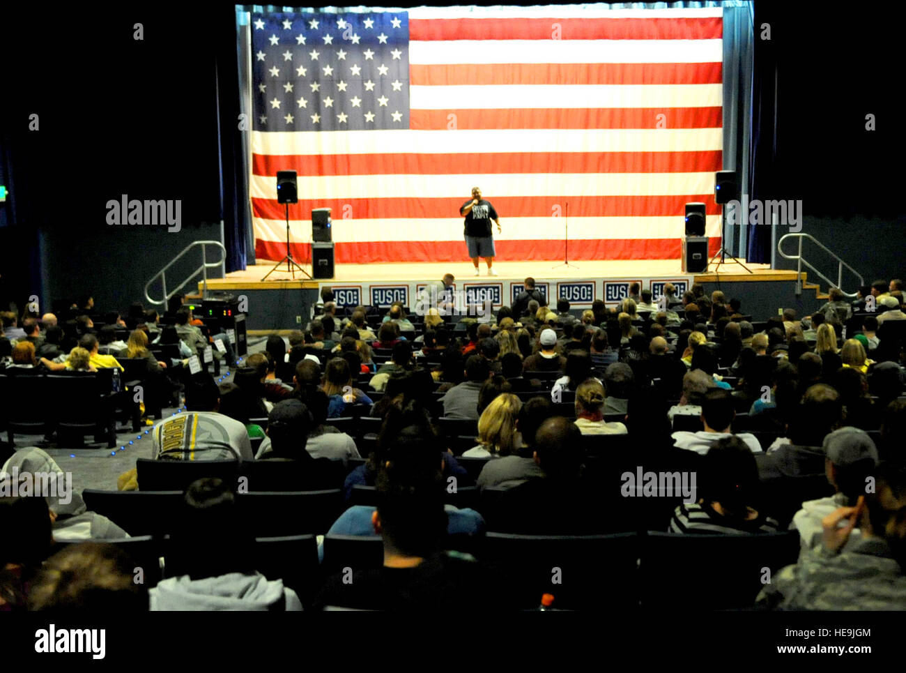 Comedian Gabriel Iglesias performs in front of a crowd at Eielson Air Force Base, Alaska, Nov. 10, 2008. Iglesias is on an eight-day USO tour with Vice Chairman of the Joint Chiefs of Staff U.S. Marine Gen. James E. Cartwright.  Air Force Master Sgt. Adam M. Stump. (Released) Stock Photo
