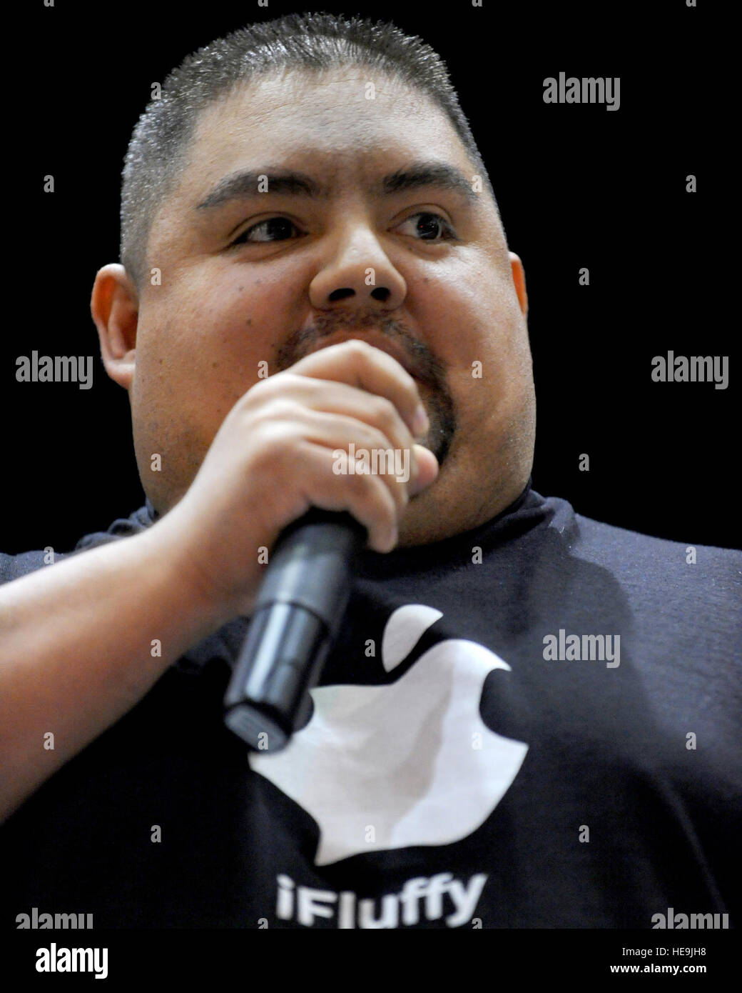 Comedian Gabriel Iglesias performs during a visit to Kunsan Air Base, Korea, Nov. 12, 2008. San Juan is with a USO group traveling with Vice Chairman of the Joint Chiefs of Staff U.S. Marine Gen. James E. Cartwright.  Air Force Master Sgt. Adam M. Stump. (Released) Stock Photo