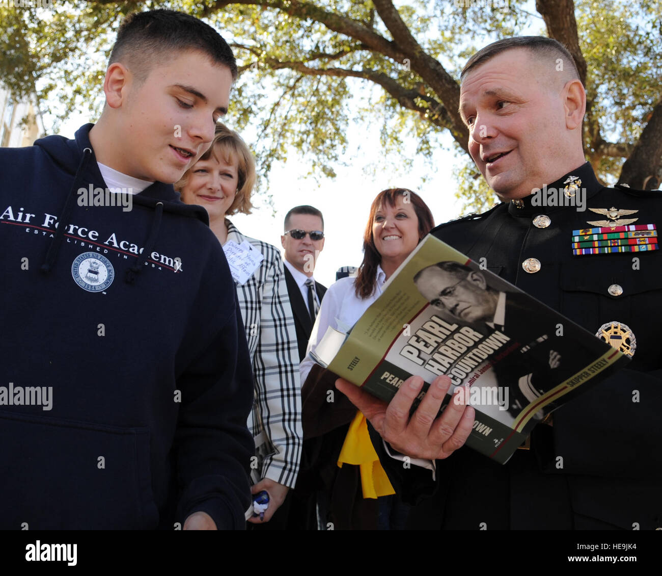 Vice Chairman of the Joint Chiefs of Staff U.S. Marine Gen. James E. Cartwright signs a book for Nick Cartwright at the Pearl Harbor Survivors Memorial Service in Fredericksburg, Texas, Dec. 7, 2008. Cartwright was the guest speaker at the event, held in front of The National Museum of the Pacific War in the hometown of U.S. Navy Fleet Adm. Chester W. Nimitz.  Air Force Master Sgt. Adam M. Stump. (Released) Stock Photo