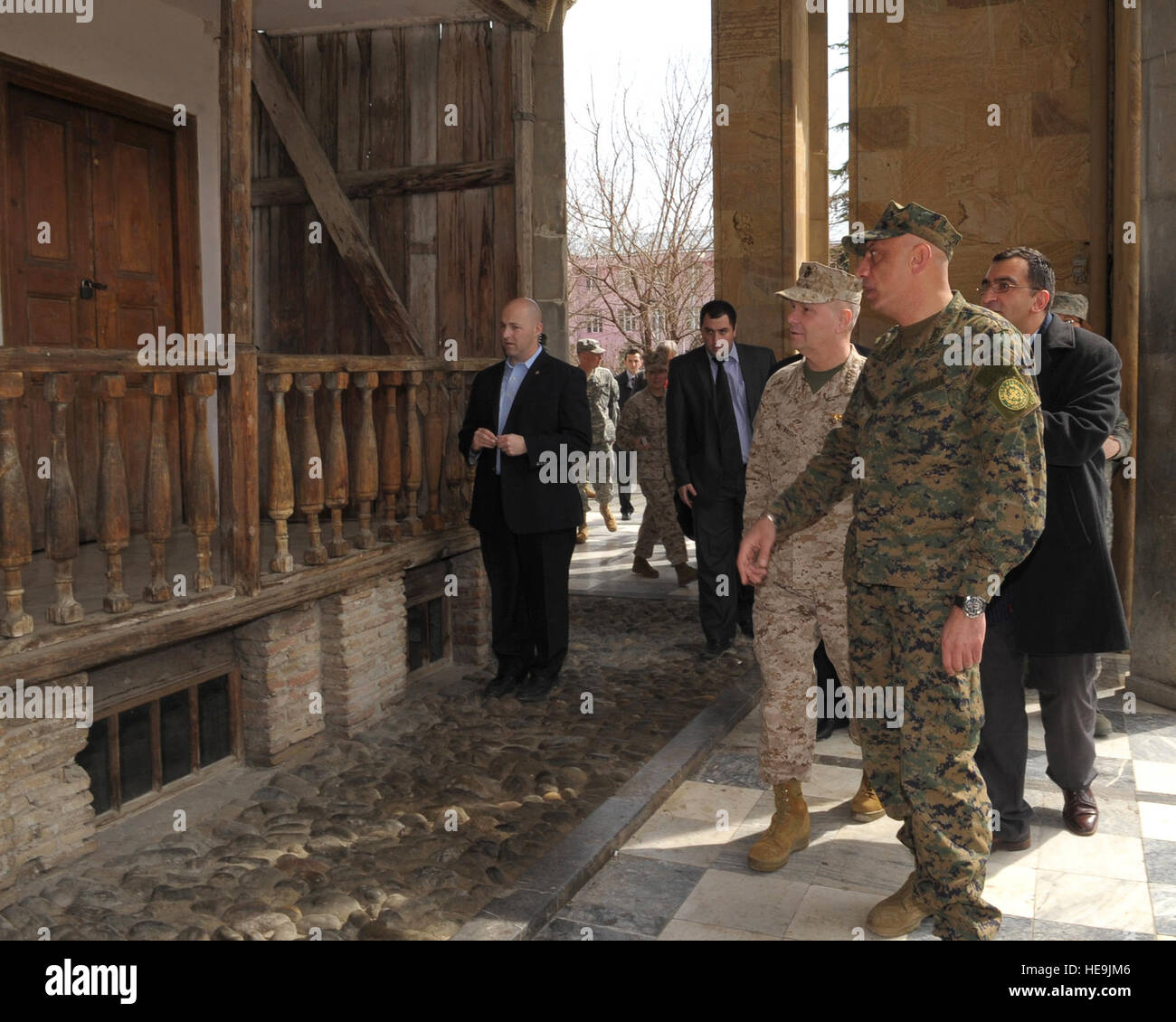 Georgian Chief of Defense Maj. Gen. Devi Tchonkotadze, right, and Vice Chairman of the Joint Chiefs of Staff U.S. Marine Gen. James E. Cartwright look at the house Joseph Stalin was born in during a visit to Gori, Georgia, March 30, 2009. The house is part of a museum compound that honors the former Russian leader. (Released) Stock Photo