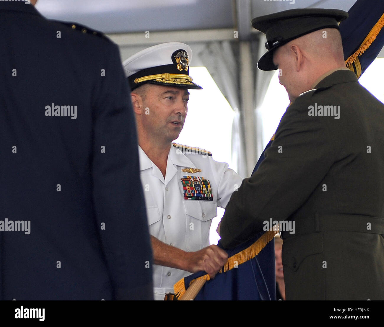 U.S. Navy ADM James Stavridis relinquishes command to Vice Chairman Joint Chiefs of Staff Gen. James E. Cartwright as Air Force GEN Doug Fraser takes over as Southern Command Commander, Miami, Fla., June 25, 2009.. DOD  Air Force Master Sgt. Jerry Morrison() Stock Photo
