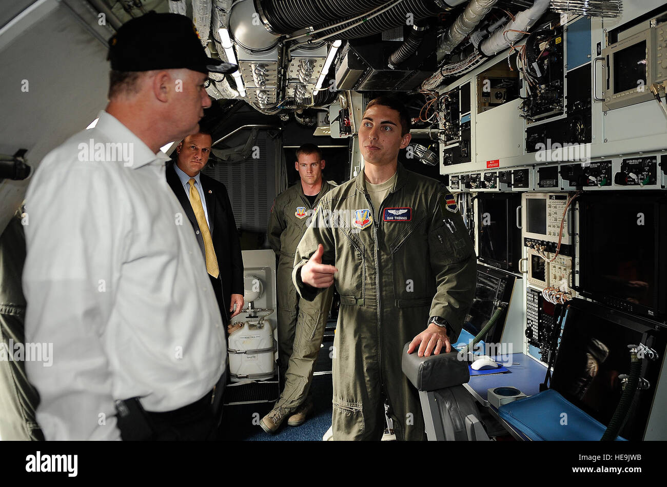 Deputy Secreatry of Defense WIlliam J. Lynn III talks with Air Force Captain Dan Thomas, RC-135 Rivet Joint aircrew member while on a visit to Offutt Air Force Base, Neb., May 26, 2010.  Master Sgt. Jerry Morrison() Stock Photo