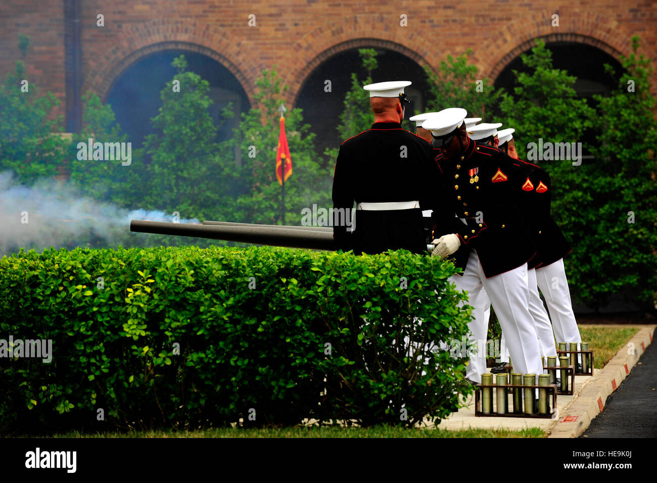 Marines from the Body Bearers Section, Bravo Company, fire a saluting battery at the farewell tribute for Joint Chiefs of Staff Vice Chairman Gen. James E. Cartwright at the Marine Corps Barracks, Washington, D.C., Aug. 3, 2011.  Tech. Sgt. Jacob N. Bailey, U.S. Air Force Stock Photo