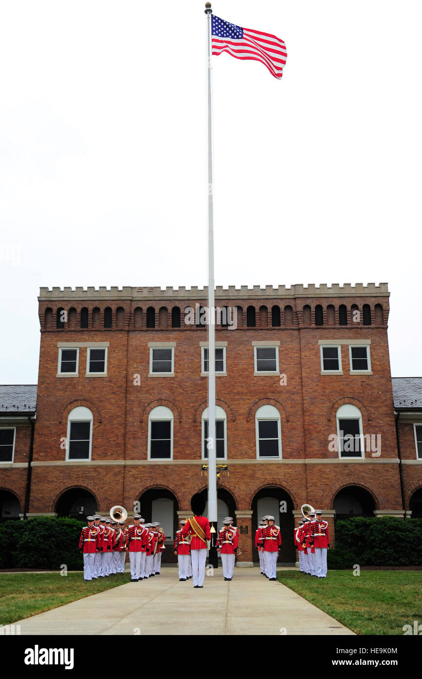 The United States Marine Corps Drum and Bugle Corps, "The Commandant's Own," perform at the farewell tribute for Joint Chiefs of Staff Vice Chairman Gen. James E. Cartwright at the Marine Corps Barracks, Washington, D.C., Aug. 3, 2011.  Tech. Sgt. Jacob N. Bailey, U.S. Air Force Stock Photo