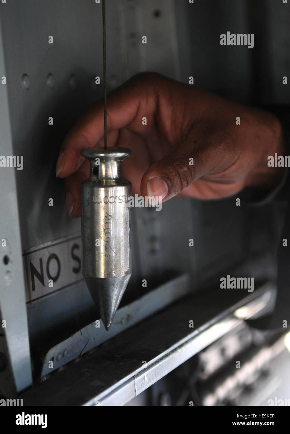 Tech. Sgt. Leo Riley, 100th Aircraft Maintenance Squadron, steadies a ...