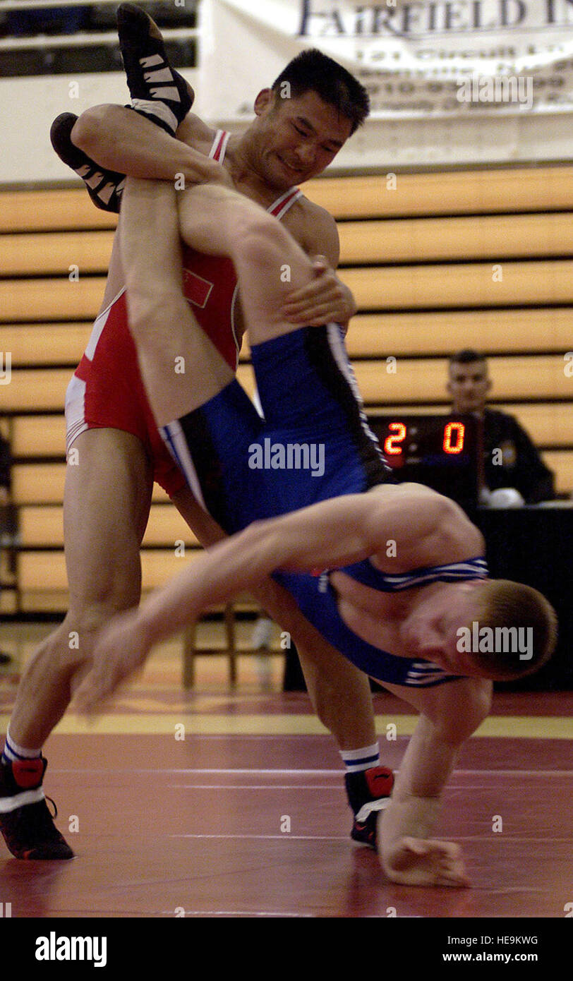 Xiaosheng Fang, from China, turns his opponent Anthanasios Kydros, from