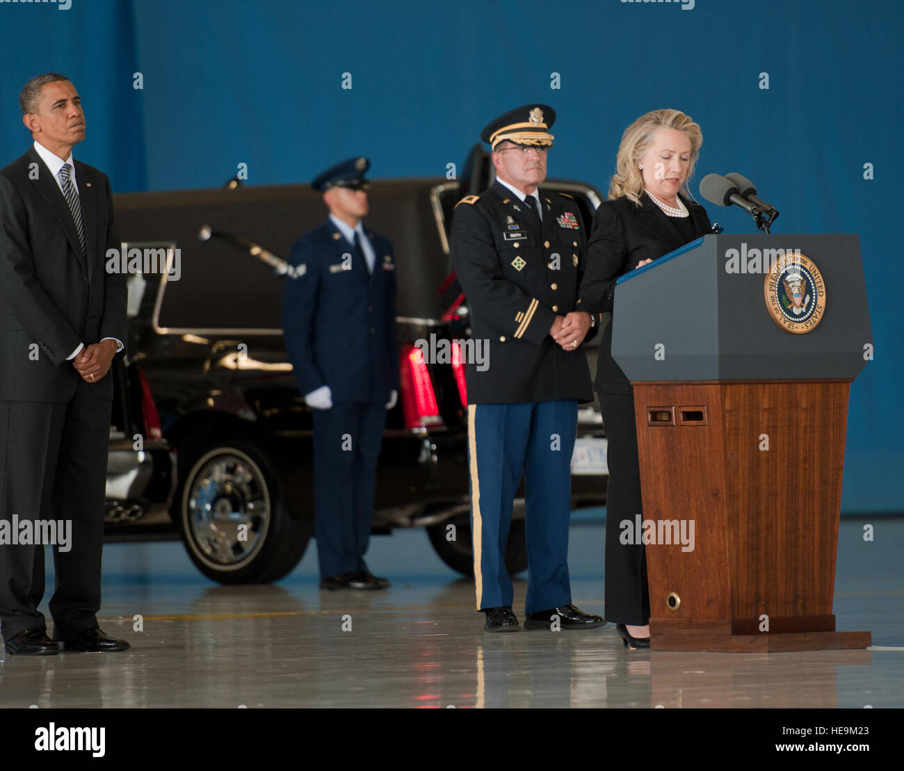 Secretary of State Hillary Clinton speaks during the dignified transfer of remains for J. Christopher Stevens, U.S. ambassador to Libya, and three other Americans,  Sept. 14, 2012, at Joint Base Andrews, Md. The U.S. State Department held a ceremony on base to honor the Americans who gave their lives in service to their country.  Senior Airman Perry Aston) (Released) Stock Photo