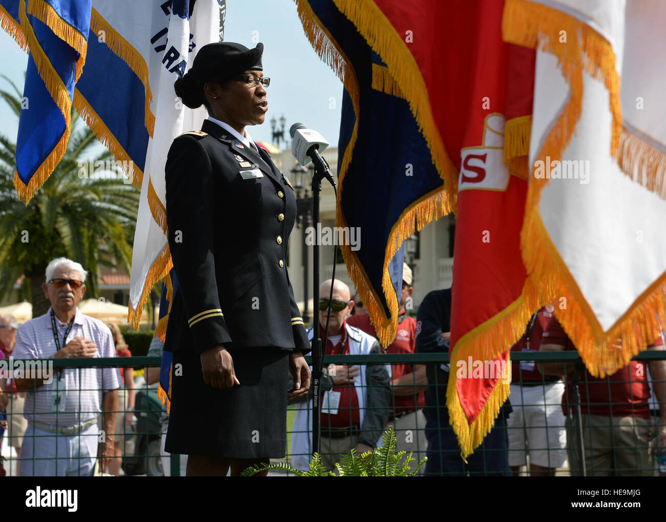 Army Maj. Delmayca Kramer, a 12-year veteran and native of Hephzibah, Ga., who works in the J-1 Personnel division of U.S. Southern Command in Miami, Fla., performs the National Anthem at the opening ceremony of the World Golf Championship. The event, one of the sports largest, is being held through March 6 at the Trump National Doral.  Raymond Sarracino/U.S. Southern Command Public Affairs) Stock Photo