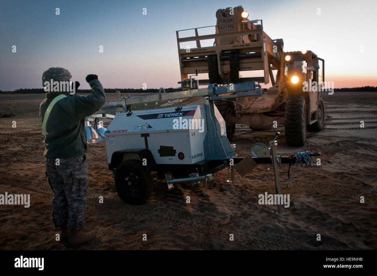 U.S. Army personnel from the 690th Rapid Port Opening Element position ...