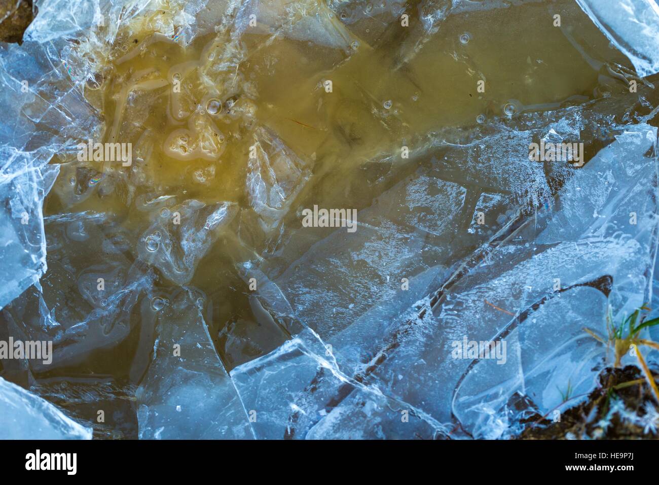 Ice on water texture> Cracked texture. Close up of winter frozen water ...