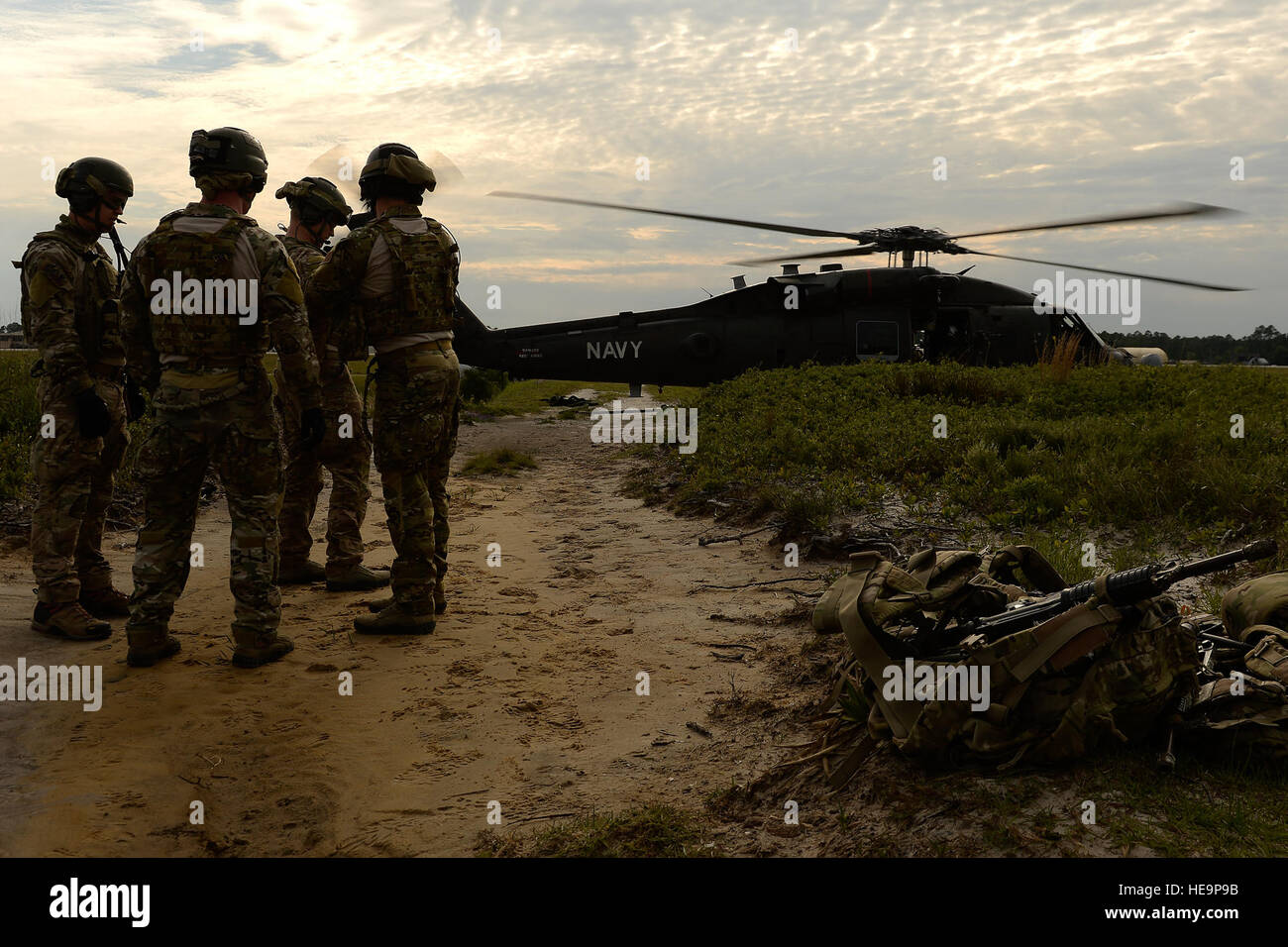 Seahawk Fast Roping Combat controllers conduct fast-rope insertion training from a U.S ...