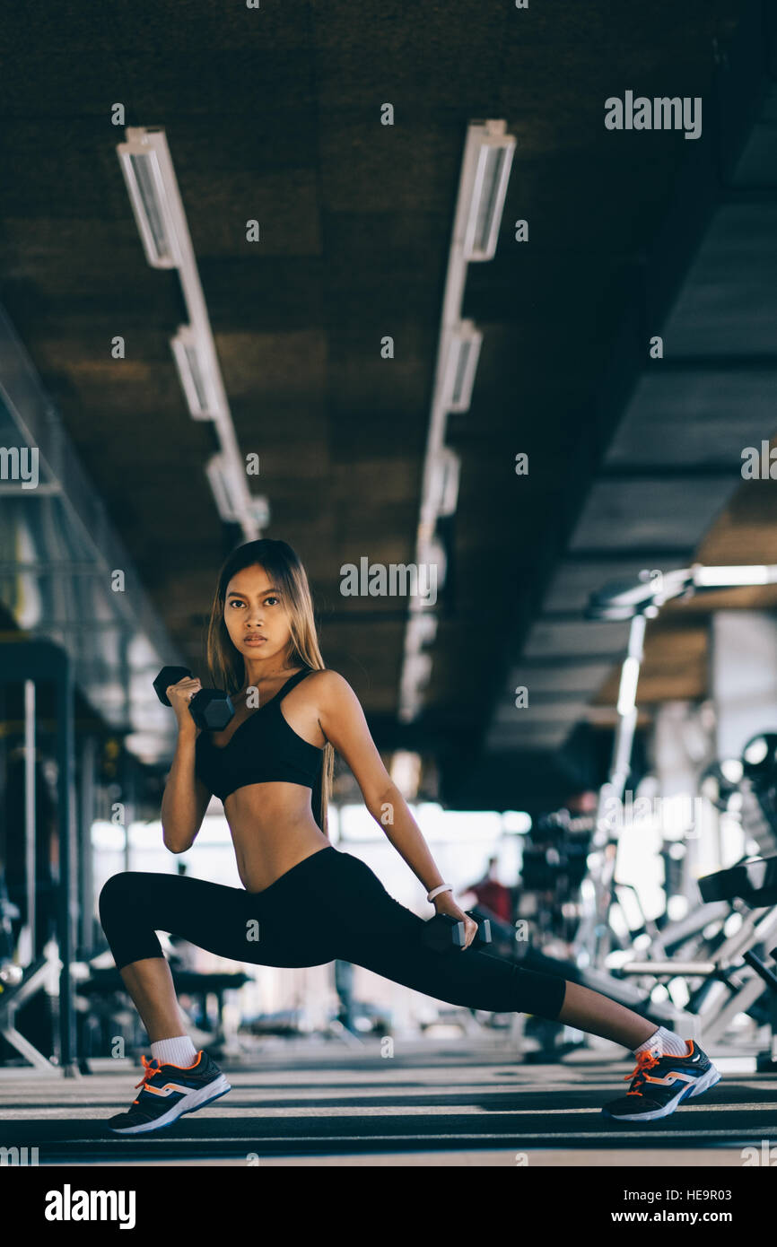 Asian fitness girl on workout Stock Photo