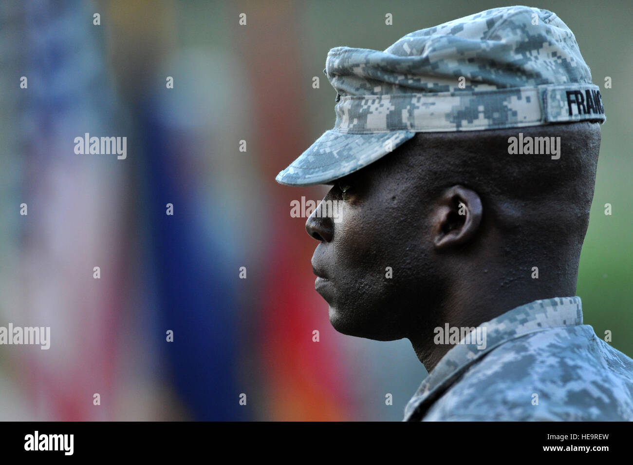 GUANTANAMO BAY, Cuba –, Army Capt. Nick Francois, 193rd Military Police Company commander, prepares to speak to a soldier of the193rd MP Company after assuming command at the change of command ceremony, Joint Task Force Guantanamo Bay, June 4, 2010. The 193rd MP Company is responsible for a portion of the guard duties at JTF Guantanamo. JTF Guantanamo conducts safe, humane, legal and transparent care and custody of detainees, including those convicted by military commission and those ordered released by a court. The JTF conducts intelligence collection, analysis and dissemination for the prote Stock Photo