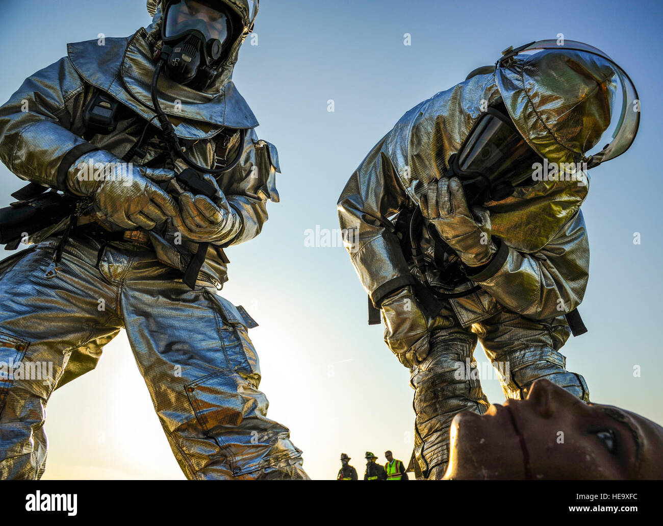 Staff Sgt. Nathan Williams and Senior Airman Justin Caldwell, 19th Civil  Engineer Squadron firefighters, inspect a simulated casualty as part of a  major accident response inspection April 22, 2015, in Jacksonville, Ark.