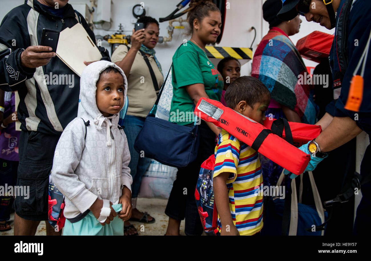 SAVUSAVU, Fiji (June 18, 2015) Fijian patients prepare to depart the hospital ship USNS Mercy (T-AH 19) during Pacific Partnership 2015. Patients returned to shore after receiving medical treatment on board. Mercy is currently in Savusavu, Fiji, for the first mission port of PP15. Pacific Partnership is in its 10th iteration and is the largest annual multilateral humanitarian assistance and disaster relief preparedness mission conducted in the Indo-Asia-Pacific region. While training for crisis conditions, Pacific Partnership missions to date have provided real world medical care to approximat Stock Photo