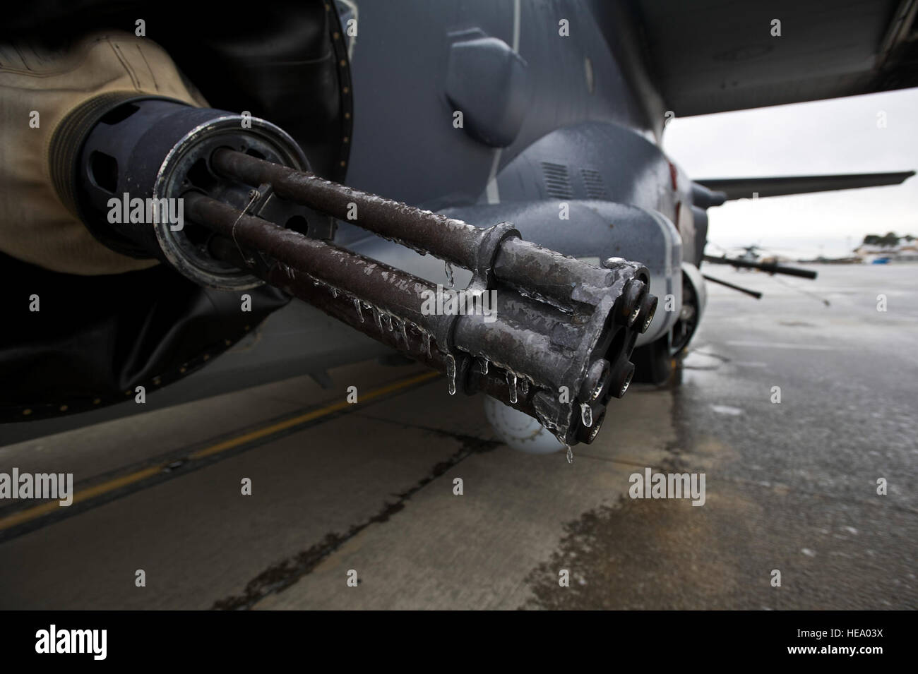 Icicles drip from a 25mm Gatling gun at Hurlburt Field, Fla., Jan. 29, 2014. Freezing rain and cold temperatures layered the entire area in a thin sheet of ice, making roads unsafe and closing military bases.(U.S. Air Force Photo/ Staff Sgt. John Bainter) Stock Photo