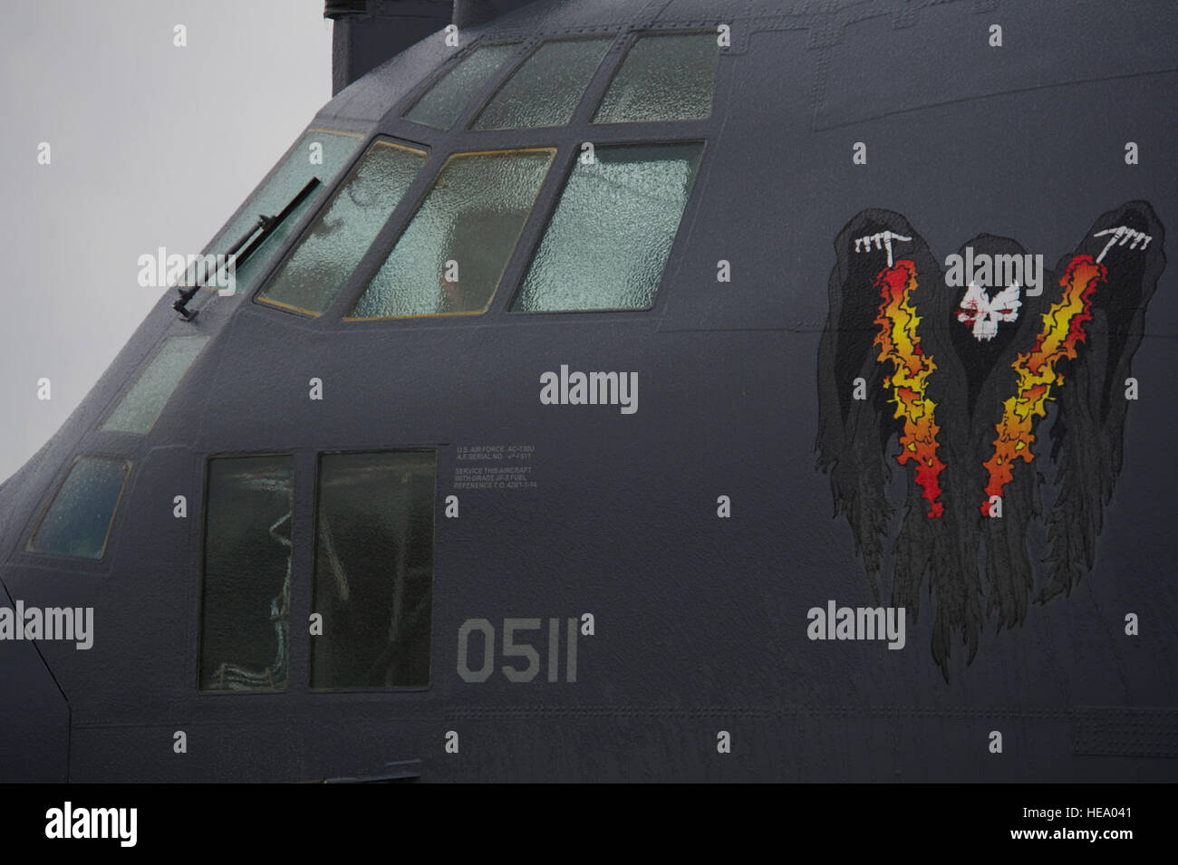 Ice coats the windshield of an AC-130U Spooky gunship at Hurlburt Field, Fla., Jan. 29, 2014. Freezing rain and plunging temperatures left the entire aircraft covered in a thin layer of ice. (U.S. Air Force Photo/ Staff Sgt. John Bainter) Stock Photo