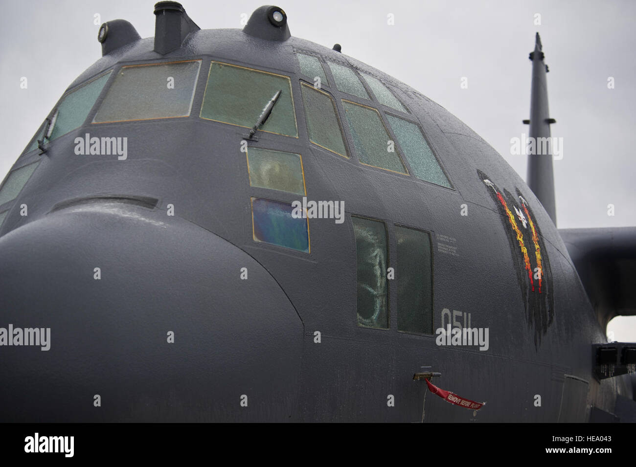 Ice coats the nose and windshield of an AC-130U Spooky gunship at Hurlburt Field, Fla., Jan. 29, 2014. Freezing rain and plunging temperatures left the entire aircraft covered in a thin layer of ice. (U.S. Air Force Photo/ Staff Sgt. John Bainter) Stock Photo