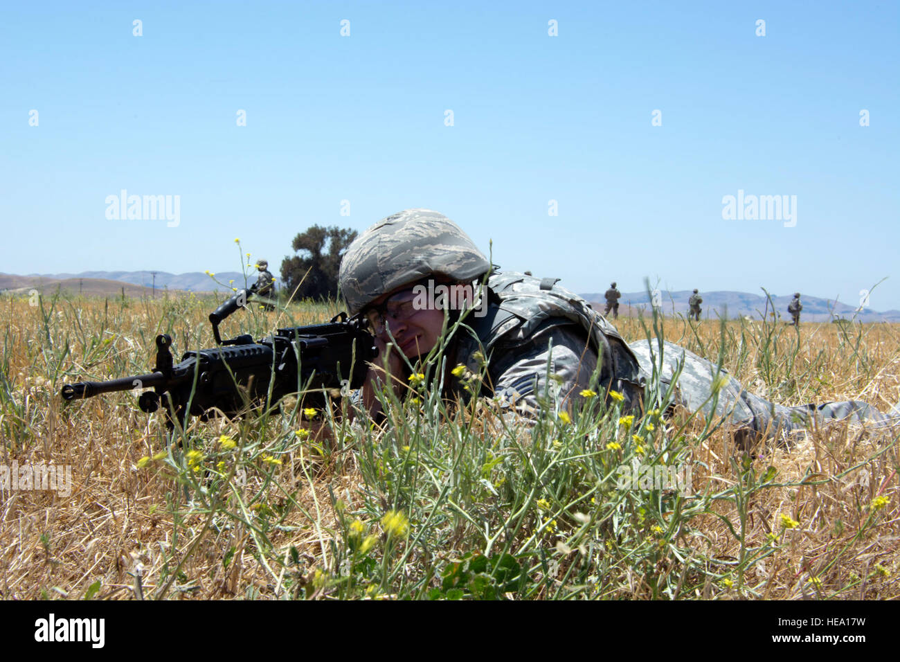 Senior Airman Jake Chanay, 349th Security Forces Squadron, sets up ...