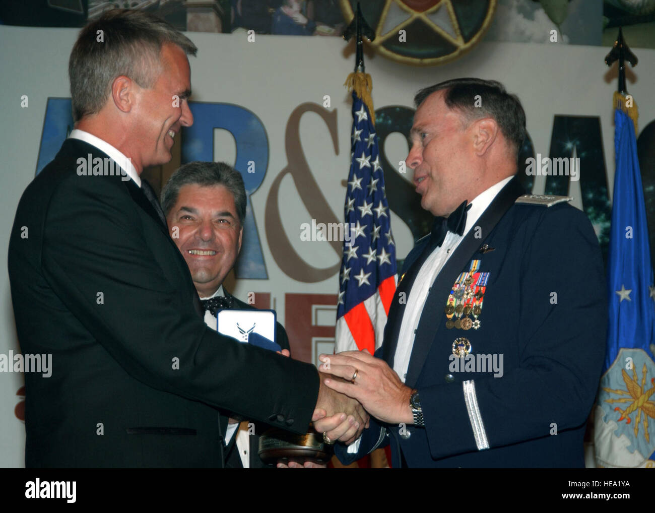 WASHINGTON -- Air Force Chief of Staff Gen. John P. Jumper recognizes  Richard Dean Anderson for his role in the "Stargate SG-1" television series  and for the show's continuous positive depiction of