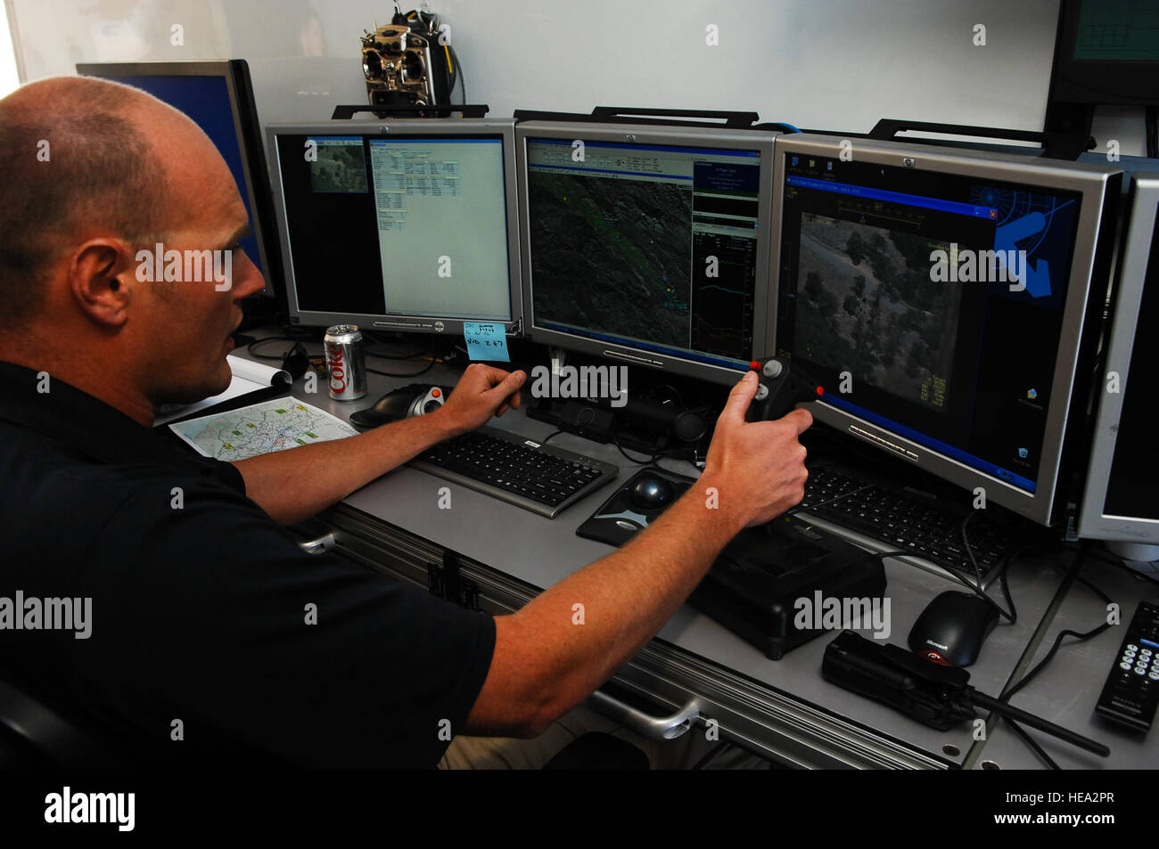 Mr. Adam Stock, lead pilot for 29 Palms Unmanned Aerial Systems, pilots a Scan Eagle unmanned