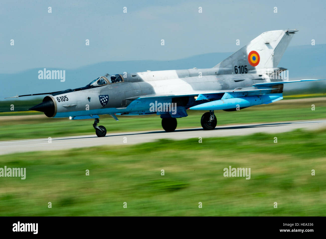 A Romanian air force MiG-21 LanceR fighter aircraft takes off from the flightline during the RoAF's 71st Air Base's air show and open house at Campia Turzii, Romania, July 23, 2016. The aviation demonstration took place during the middle of the U.S. Air Force's 194th Expeditionary Fighter Squadron's six-month long theater security package deployment to Europe in support of Operation Atlantic Resolve, which aims to bolster the U.S.'s continued commitment to the collective security of NATO and dedication to the enduring peace and stability in the region. The unit, comprised of more than 200 CANG Stock Photo