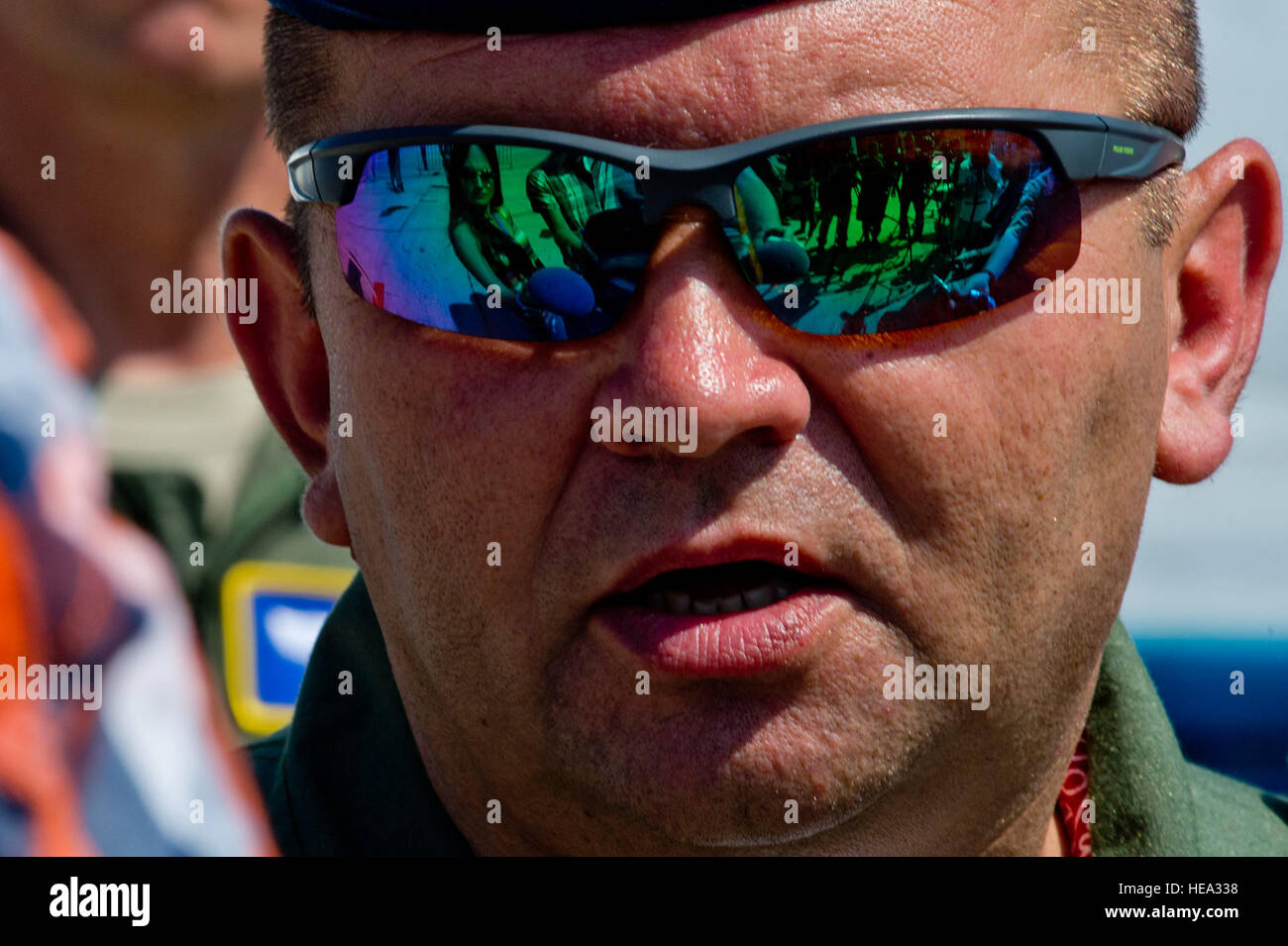 Romanian air force Col. Marius Oatu, 71st Air Base commander, answers reporters' questions during his base's air show and open house at Campia Turzii, Romania, July 23, 2016. The aviation demonstration took place during the middle of the U.S. Air Force's 194th Expeditionary Fighter Squadron's six-month long theater security package deployment to Europe in support of Operation Atlantic Resolve, which aims to bolster the U.S.'s continued commitment to the collective security of NATO and dedication to the enduring peace and stability in the region. The unit, comprised of more than 200 CANG Airmen Stock Photo