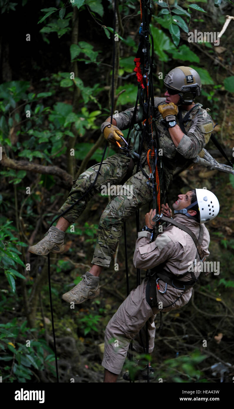 A pararescueman from the 31st Rescue Squadron secures and evacuates a ...