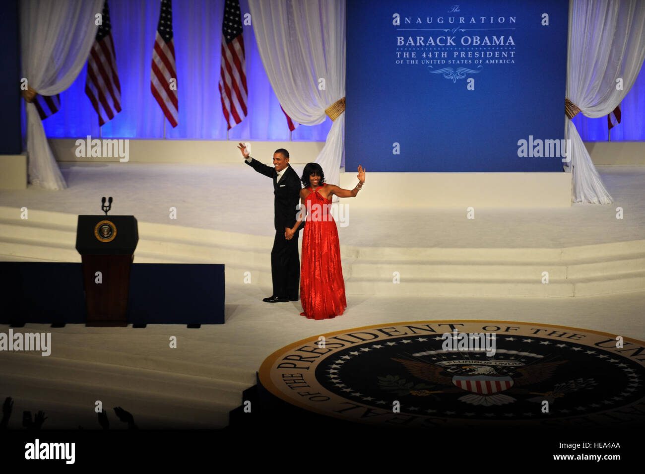 President Barack Obama and his wife Michelle Obama wave at the crowd as they depart from the 2013 Commander In Chief inaugural ball at the Walter E. Washington Convention Center in Washington D.C., Jan. 21, 2013.  Throughout the 57th Presidential Inauguration, the Obama and Biden families have taken the opportunity to highlight the spirit of service and selflessness seen everyday U.S. military men, women and their families.  Chief Master Sgt. Robert W. Valenca Stock Photo