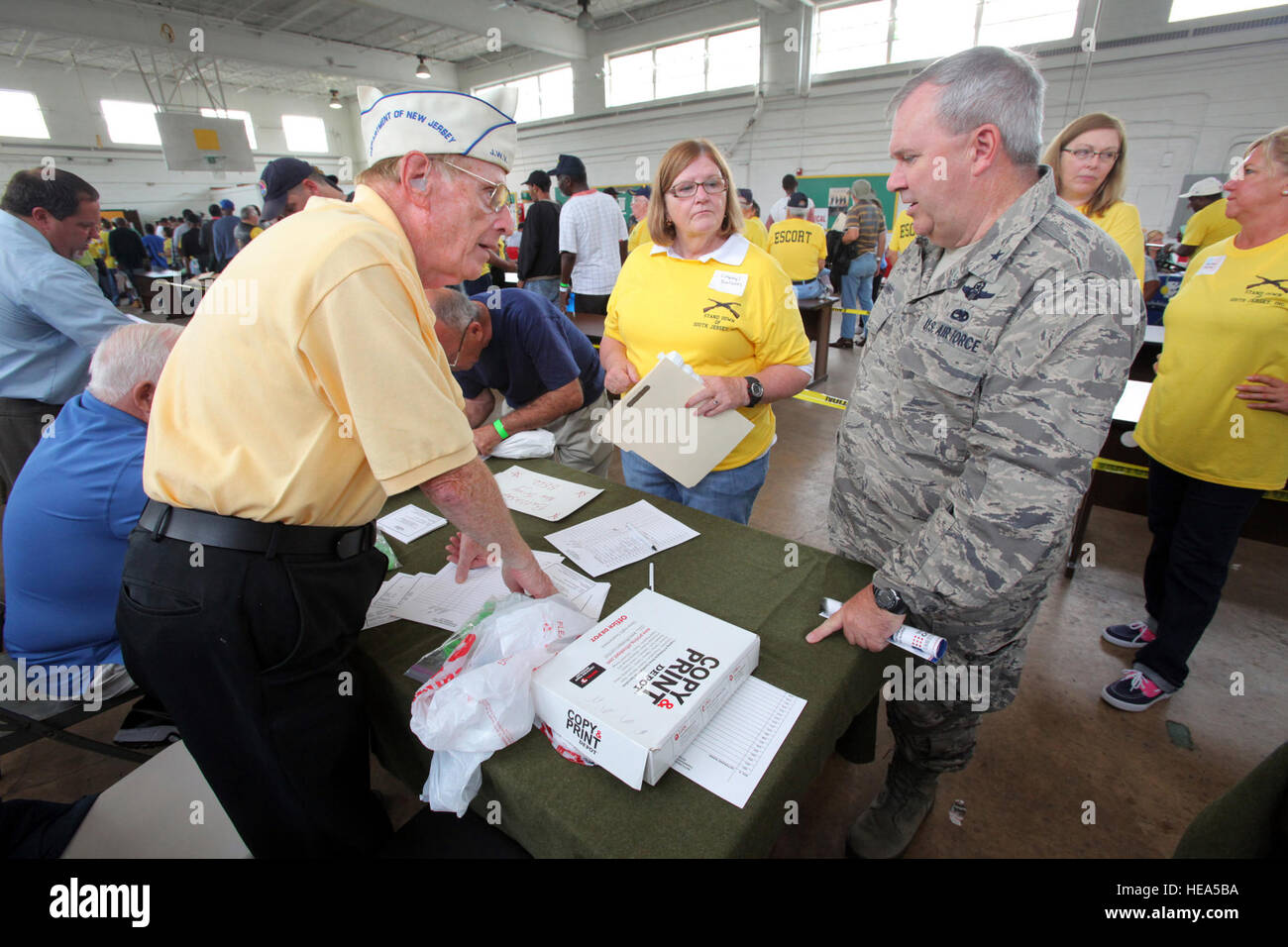 Brig. Gen. Michael L. Cunniff, right, The Adjutant General of New Jersey, speaks to a group of volunteers during Stand Down 2012 at the National Guard Armory in Cherry Hill Sept. 28, 2012.  The New Jersey Department of Military and Veterans Affairs along with New Jersey National Guard soldiers and airmen and the Stand Down of South Jersey Committee, Inc. co-hosted the Stand Down to provide homeless veterans with access to healthcare, mental health screening, substance abuse counseling, social services - food stamps and unemployment, legal services, religious counseling, a hot meal, a haircut a Stock Photo