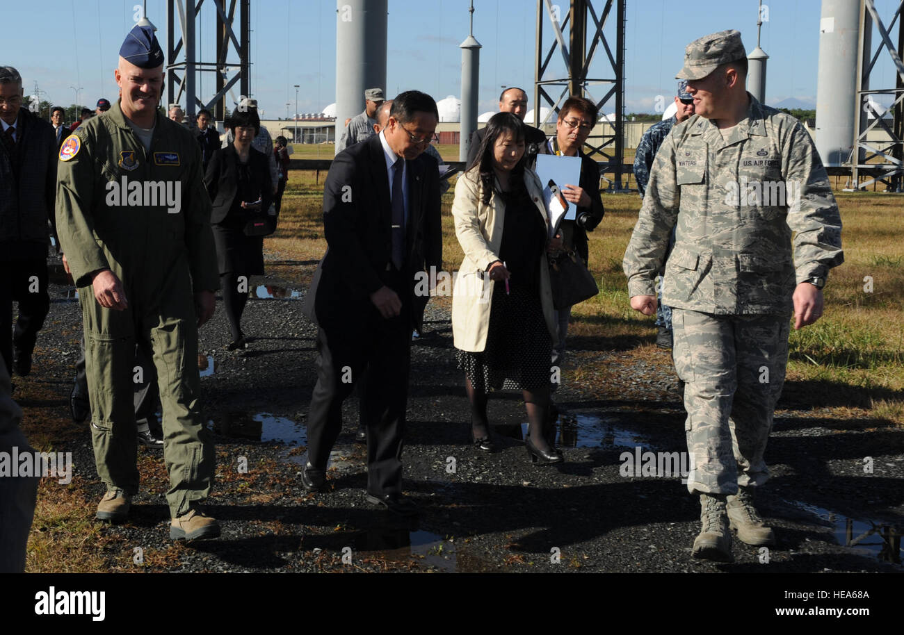 Misawa Air Base leadership conducts a tour of the “Elephant Cage” for Misawa City officials during the demolition ceremony for the structure at Misawa Air Base, Japan, Oct. 15, 2014. The AN/FLR-9 antenna is approximately 1,443 feet in diameter and more than 120 feet tall.  Airman Jordyn Rucker Stock Photo
