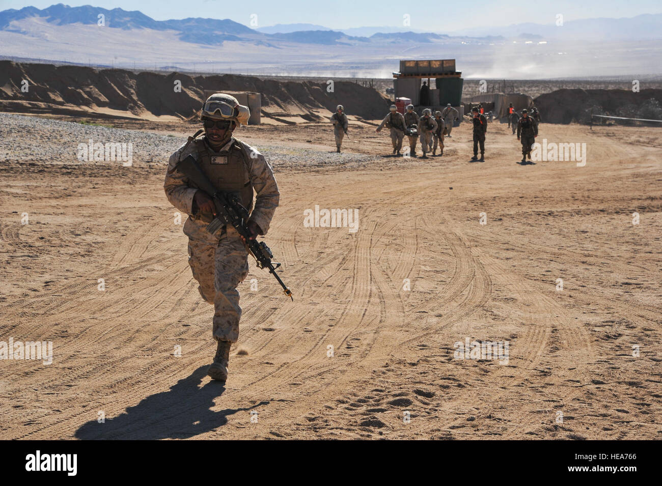 U.S. Marines participate in patient transport during Integrated Training Exercise 2-15 at Marine Corps Air Ground Combat Center Twentynine Palms (MCAGCC), Calif., Feb. 11, 2015. MCAGCC conducts relevant live-fire combined arms training, urban operations, and joint/coalition level integration training that promotes operational forces' readiness.  Tech. Sgt. Joselito Aribuabo Stock Photo