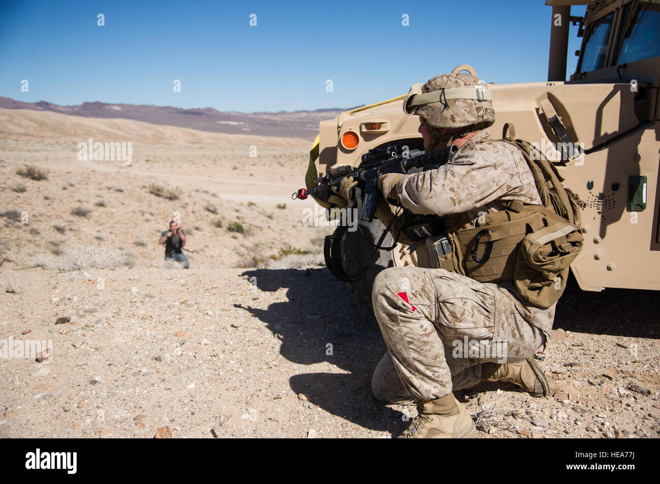 U.S. Marine 1st Lt. Hugh McShane, logistics officer assigned to Combat Logistics Battalion 13, Headquarters Regiment, Camp Pendleton, Calif., engages an opposing forces player during Integrated Training Exercise 2-15 at Marine Corps Air Ground Combat Center Twentynine Palms (MCAGCC), Calif., Feb. 13, 2015. MCAGCC conducts relevant live-fire combined arms training, urban operations, and joint/coalition level integration training that promotes operational forces' readiness.  Tech. Sgt. Joselito Aribuabo Stock Photo