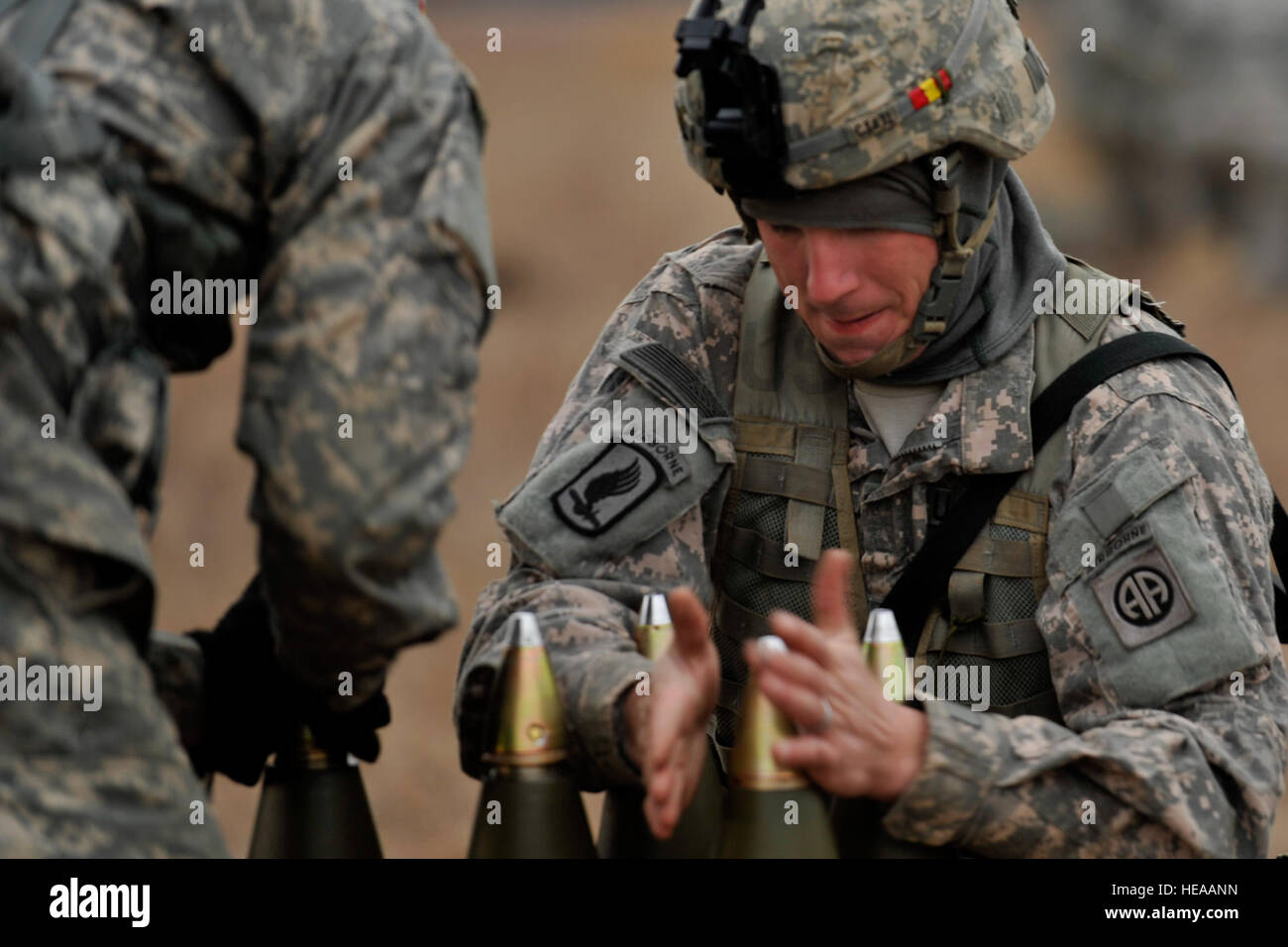 Army artillery personnel load and prepare 155 mm ammunition for the ...