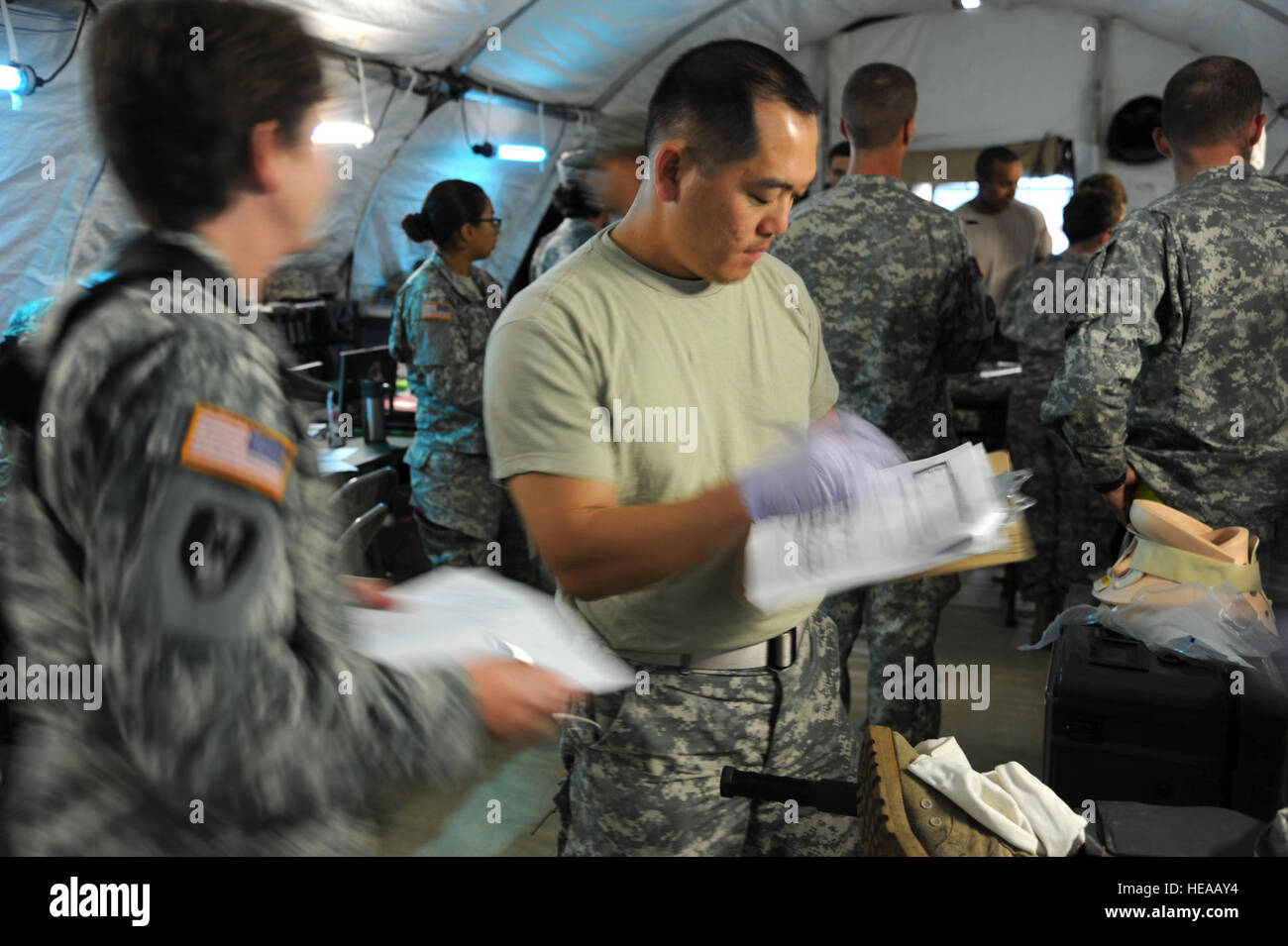U.S. Army doctors and nurses handle a mass casualty flow of notional