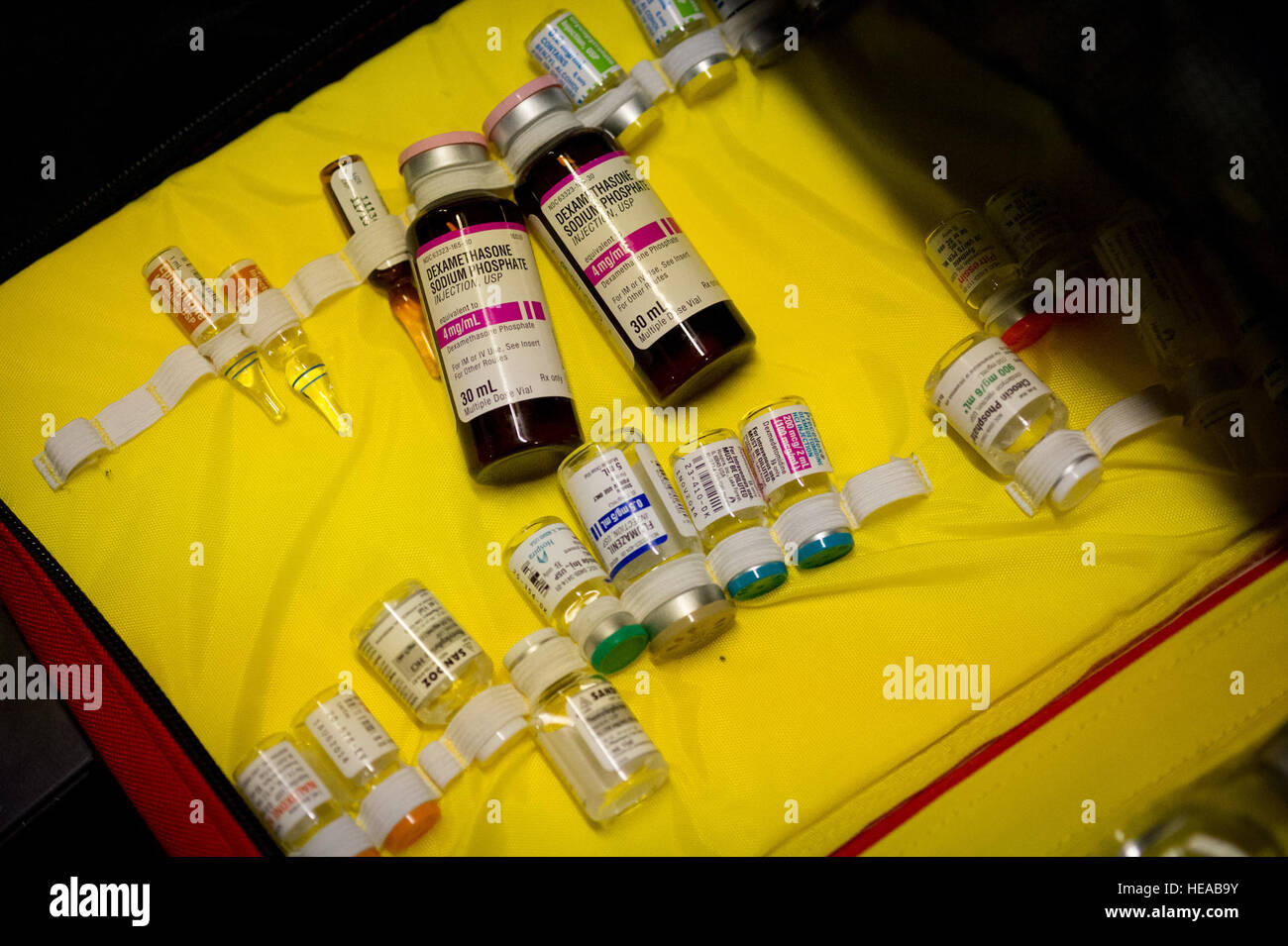 Vials of medicine secured in a case are ready for use by the Tactical Critical Care Expeditionary Team – Enhanced (TCCET-E) team if they are needed while in-flight aboard a C-17 Globemaster III at Joint Readiness Training Center (JRTC), Fort Polk, La., Jan. 17, 2014. Service members at JRTC 14-03 are educated in combat patient care and aeromedical evacuation in a simulated combat environment.  Master Sgt. John R. Nimmo, Sr./) Stock Photo