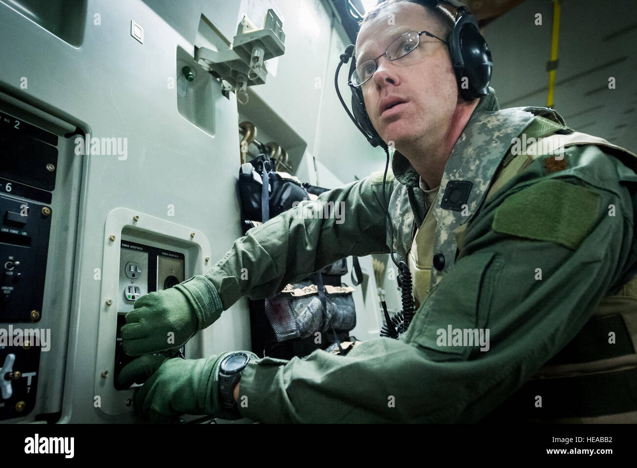 U.S. Air Force Maj. Corey Norton, flight nurse, 43rd Aeromedical ...