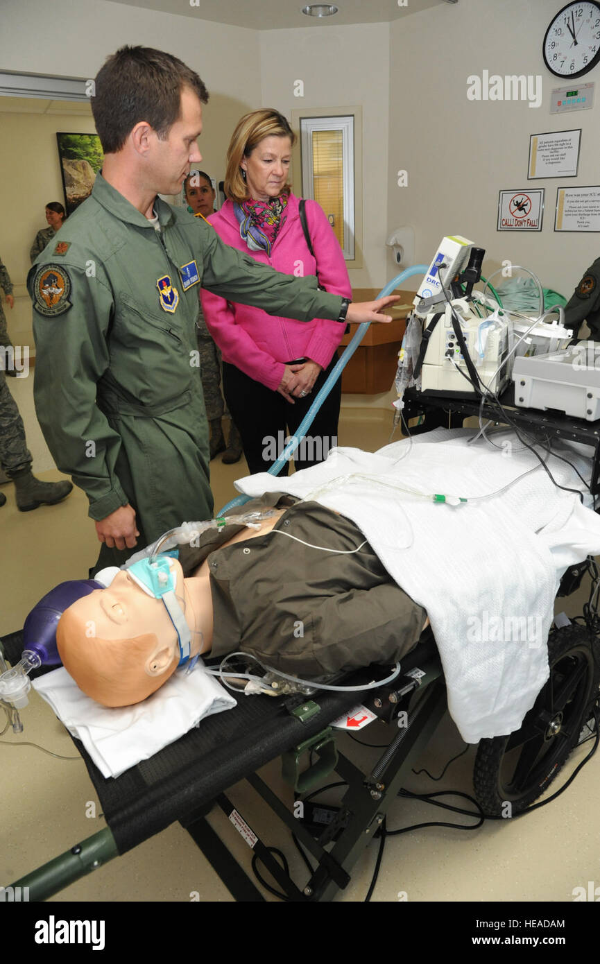 U.S. Air Force Maj. Shawn French, left, with the 81st Medical Operations Squadron, briefs Kim Rand, the wife of Gen. Robin Rand, the commander of Air Education and Training Command, on the critical care air transport team training equipment at the Keesler Medical Center at Keesler Air Force Base, Miss., Nov. 14, 2013.  Kemberly Groue Stock Photo