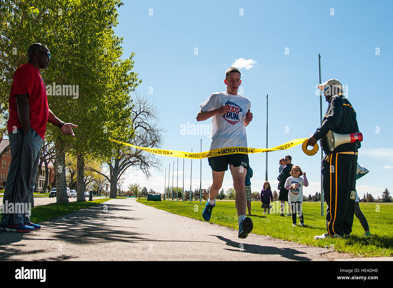 Brock Thompson, 15, crosses the finish line of the America’s Kids Run