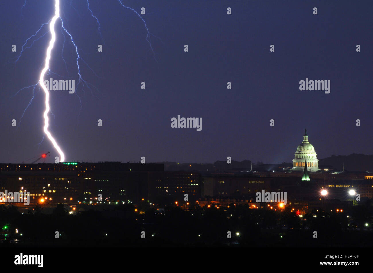 Lightening strikes near the U.S. Capitol building during a thunderstorm in Washington, D.C., May 14, 2005.   Tech. Sgt. Cherie A. Thurlby, U.S. Air Force. Stock Photo