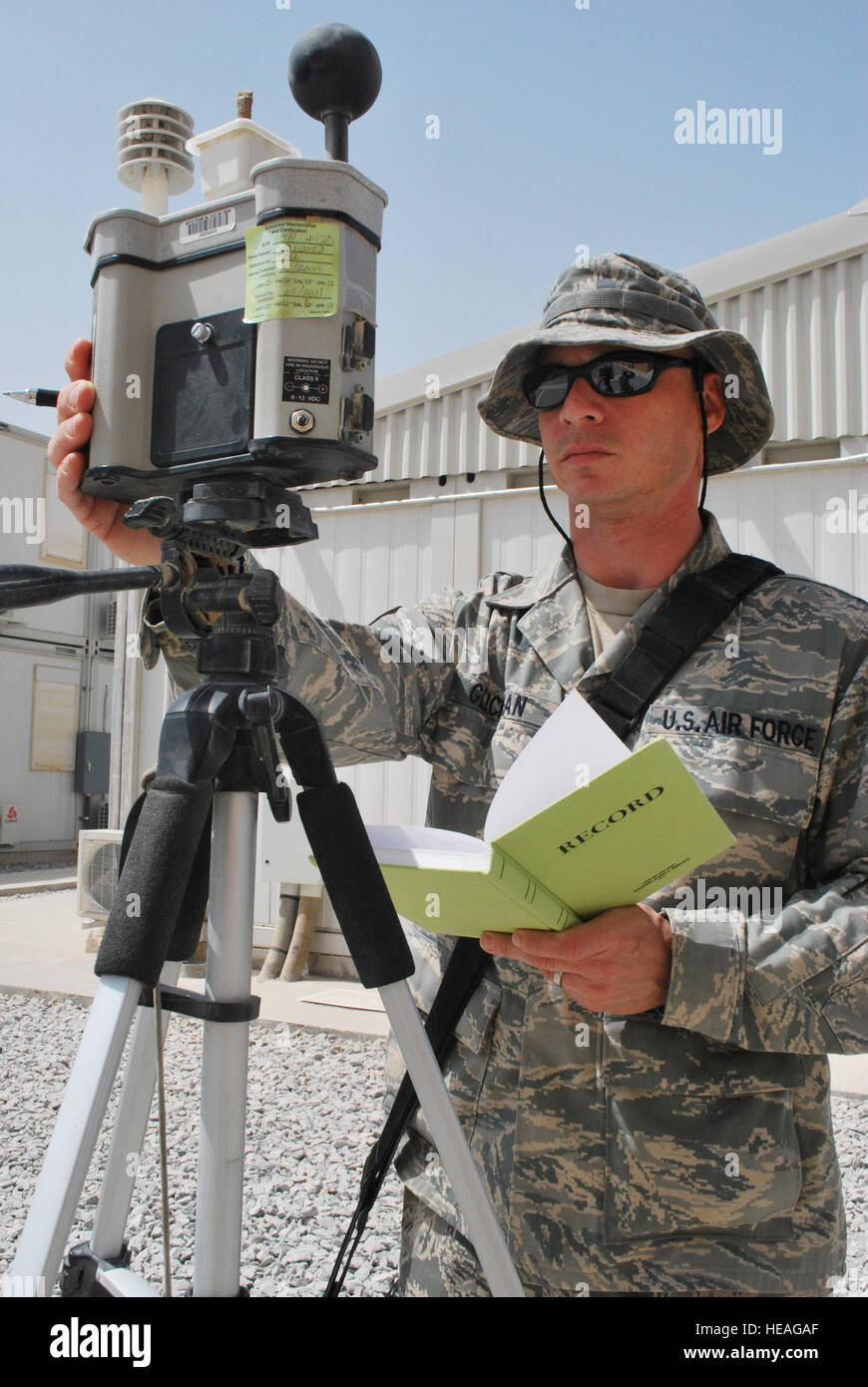 Tech. Sgt. James Glickman monitors the wet bulb globe temperature heat stress readings Aug. 18 at Kandahar Airfield, Afghanistan. Sergeant Glickman is a bioenvironmental engineering craftsman assigned to the 451st AEW Clinic.  Senior Airman Melissa B. White Stock Photo
