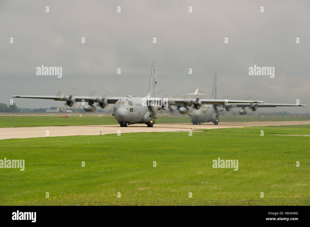 U.S. Air Force C-130 Hercules aircraft taxi on the taxiway during Maple ...