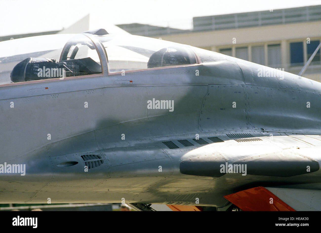 The left wing root and canopy of a Soviet MiG-29UB Fulcrum aircraft are ...