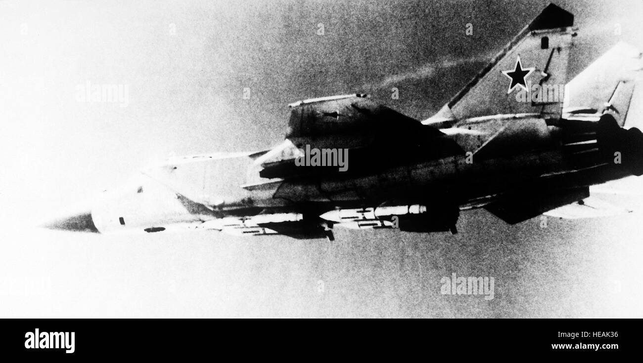 A Soviet MiG-31 Foxhound aircraft armed with AA-9 missiles in flight. Stock Photo